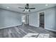 Spacious bedroom featuring hardwood floors, ceiling fan, and neutral wall color at 7461 Church Hill Rd, Hollywood, SC 29449