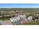 Scenic aerial view showcasing the properties, lush surroundings, and the serene lake backdrop at 801 Balgrove Ct # 801, Mount Pleasant, SC 29466