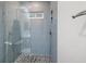 Contemporary shower with glass enclosure and mosaic tile floor at 801 Balgrove Ct # 801, Mount Pleasant, SC 29466
