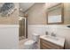 Charming bathroom features a tiled shower, vanity with sink, decorative wall art, and neutral color scheme at 801 Balgrove Ct # 801, Mount Pleasant, SC 29466