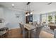 Charming dining area with hardwood floors and cozy furniture, illuminated by a pendant light fixture at 801 Balgrove Ct # 801, Mount Pleasant, SC 29466