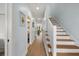 Inviting hallway with hardwood floors, staircase, and views into adjoining rooms, offering a bright and airy feel at 801 Balgrove Ct # 801, Mount Pleasant, SC 29466