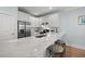 Modern kitchen with white cabinets, stainless steel appliances, and marble countertops at 801 Balgrove Ct # 801, Mount Pleasant, SC 29466
