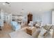Bright living room featuring hardwood floors and an open floor plan concept, connecting living space with the kitchen and dining area at 801 Balgrove Ct # 801, Mount Pleasant, SC 29466