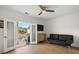 Bright living room with hardwood floors and balcony access at 801 Balgrove Ct # 801, Mount Pleasant, SC 29466