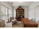 Cozy office space with a large desk, ornate cabinet, seating area, and natural light from a window at 801 Balgrove Ct # 801, Mount Pleasant, SC 29466