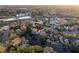 Aerial view showcasing the home's waterfront location and proximity to shopping centers, restaurants, and businesses at 810 Harbor Place Dr, Charleston, SC 29412