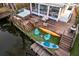 Backyard with deck, hot tub, outdoor seating, and private access to the waterway at 810 Harbor Place Dr, Charleston, SC 29412