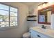 Bathroom featuring a vanity with granite countertop and an updated shower with tiled walls at 810 Harbor Place Dr, Charleston, SC 29412