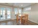 Cozy dining area with natural light and access to the outdoor patio at 810 Harbor Place Dr, Charleston, SC 29412