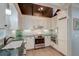 Modern kitchen with stainless steel appliances and white cabinetry at 810 Harbor Place Dr, Charleston, SC 29412