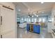 Bright kitchen with a blue island and open to the living room at 810 Harbor Place Dr, Charleston, SC 29412