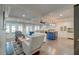 Spacious living area with coffered ceiling, fireplace, and abundant natural light at 810 Harbor Place Dr, Charleston, SC 29412