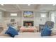 Comfortable living room features a fireplace, TV, and stylish decor at 810 Harbor Place Dr, Charleston, SC 29412