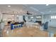 Open floor plan with a view of the kitchen island, dining table, and comfortable living room with a fireplace at 810 Harbor Place Dr, Charleston, SC 29412
