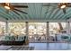 Large screened porch with ceiling fans and a beautiful waterfront view at 810 Harbor Place Dr, Charleston, SC 29412