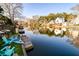 Waterfront backyard with private dock and outdoor seating at 810 Harbor Place Dr, Charleston, SC 29412