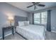 Bedroom with a queen bed, soft carpet, and a ceiling fan at 8120 Shadow Oak Dr, North Charleston, SC 29406