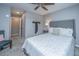 Main bedroom featuring a gray bed and white carpet at 8120 Shadow Oak Dr, North Charleston, SC 29406