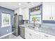 Modern kitchen featuring stainless steel appliances and granite countertops at 8120 Shadow Oak Dr, North Charleston, SC 29406