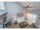 Cozy living room showcasing a fireplace, plush white sofa, and elegant decor at 8120 Shadow Oak Dr, North Charleston, SC 29406