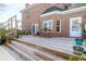 Large wooden back deck with seating and outdoor dining area at 904 Watermelon Run, Charleston, SC 29412