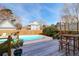 Inviting backyard features a pool, wooden deck, and lush landscaping at 904 Watermelon Run, Charleston, SC 29412