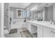 Well-lit bathroom with tub, shower and double sink vanity at 904 Watermelon Run, Charleston, SC 29412