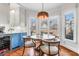 Cozy breakfast nook filled with natural light, offering views of the backyard and stylish décor at 904 Watermelon Run, Charleston, SC 29412