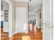 Welcoming entryway with hardwood floors and view through to open, airy living spaces at 904 Watermelon Run, Charleston, SC 29412