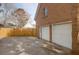 Exterior features a two car garage, a fenced backyard, and an exterior door for convenient access at 904 Watermelon Run, Charleston, SC 29412
