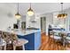 Beautiful kitchen with a large island, marble countertops, stainless steel appliances, and a dining nook at 904 Watermelon Run, Charleston, SC 29412