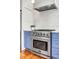 Modern kitchen showcasing a stainless steel range, white cabinets, and marble backsplash at 904 Watermelon Run, Charleston, SC 29412