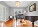 Elegant living room featuring a piano and hardwood floors at 904 Watermelon Run, Charleston, SC 29412