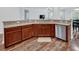 Charming kitchen corner featuring granite countertops and stainless steel dishwasher at 9981 Winged Elm St, Ladson, SC 29456