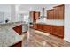 Gourmet kitchen features stainless steel appliances, gas range, and wooden cabinets at 9981 Winged Elm St, Ladson, SC 29456