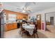 Traditional kitchen featuring wood cabinets, tile flooring, and a ceiling fan at 102 Wright Ln, Goose Creek, SC 29445