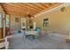 Covered porch with ceiling fan and seating, perfect for outdoor dining and relaxation at 102 Wright Ln, Goose Creek, SC 29445