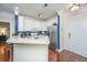 Contemporary kitchen featuring stainless steel refrigerator and white cabinets at 1025 Riverland Woods Pl # 801, Charleston, SC 29412