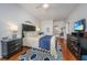 Primary bedroom with wood floors and rug at 1025 Riverland Woods Pl # 801, Charleston, SC 29412