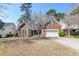 Charming brick two-story home with well-maintained lawn and inviting curb appeal at 106 Sago Palm Ct, Summerville, SC 29483