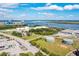 This aerial view shows industrial and recreational areas connected by a bridge over a body of water at 1079 Lockhart St, North Charleston, SC 29405