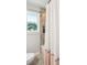 Bathroom showcasing a shower with decorative tile and a window that offers natural light at 1079 Lockhart St, North Charleston, SC 29405