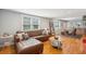 Bright living room with a leather sofa, hardwood floors and lots of natural light at 1079 Lockhart St, North Charleston, SC 29405