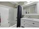 Bathroom featuring a shower-tub combination, white vanity, mirror, and modern fixtures at 110 Mapperton Ct, Summerville, SC 29485