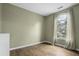 Empty bedroom with an arched window providing natural light at 110 Mapperton Ct, Summerville, SC 29485