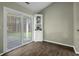 Bright dining area with a sliding glass door leading to the outside and a corner cabinet at 110 Mapperton Ct, Summerville, SC 29485