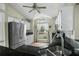 A bright kitchen featuring white cabinets, granite countertops, and a stainless steel refrigerator at 110 Mapperton Ct, Summerville, SC 29485