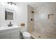A cozy bathroom with a new vanity, white tile, and new shower creates a spa-like retreat at 1114 Margaret Dr, Ladson, SC 29456