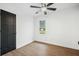 Neutral bedroom with a window to the outside with a view, wood-look flooring and a trendy, modern ceiling fan at 1114 Margaret Dr, Ladson, SC 29456